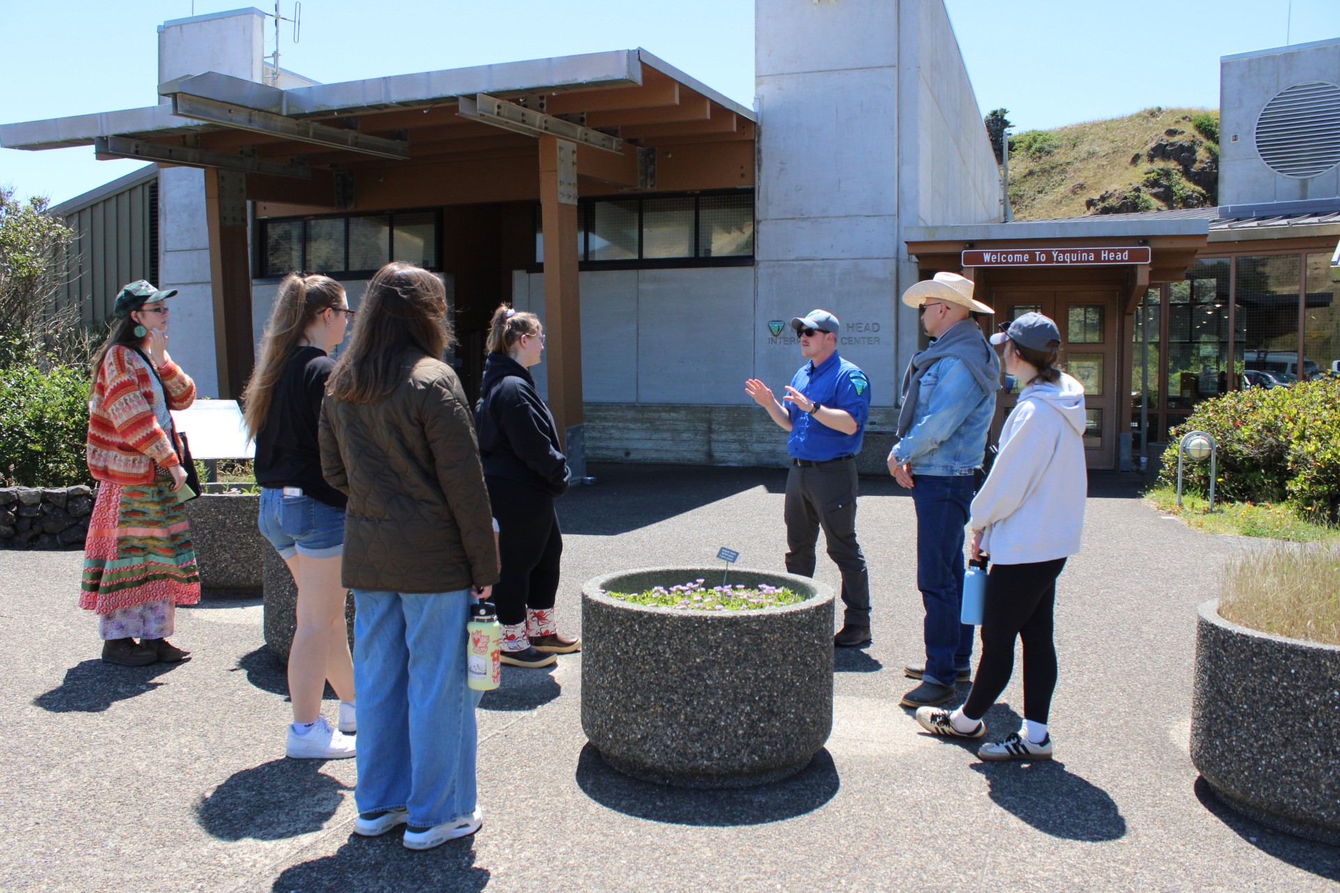Students outside a visitors center
