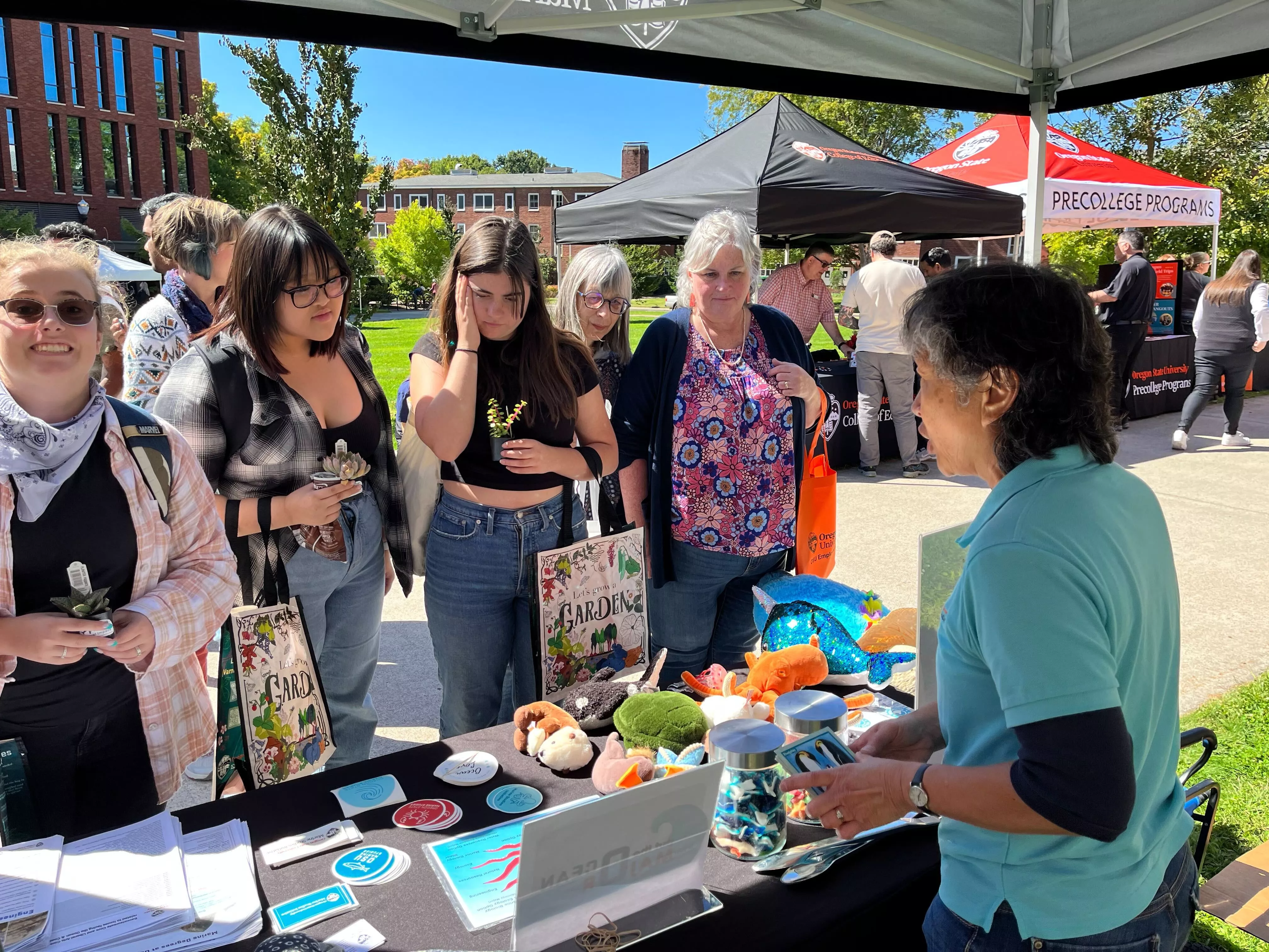 MACO staff interact with students on University Day 